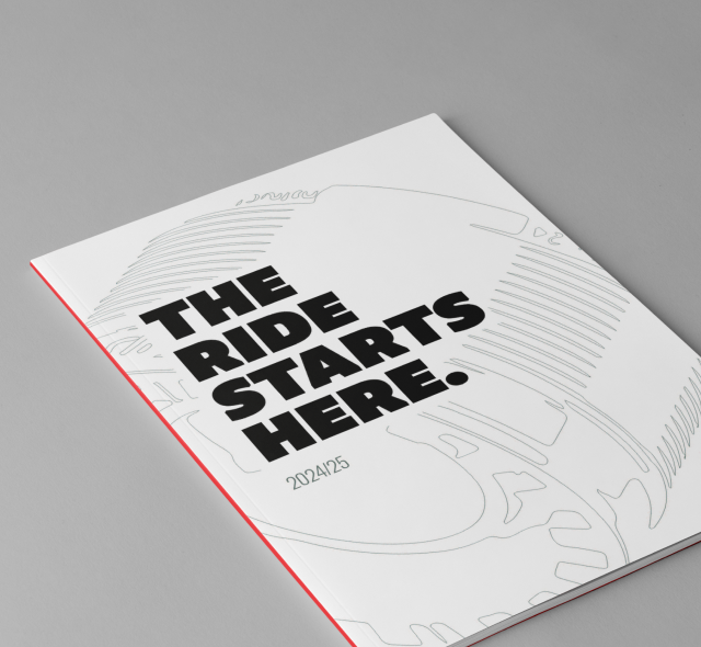 Mockup des Titel-Covers des Thun-Magazins mit der Aufschrift "THE RIDE STARTS HERE. - 2024/25"